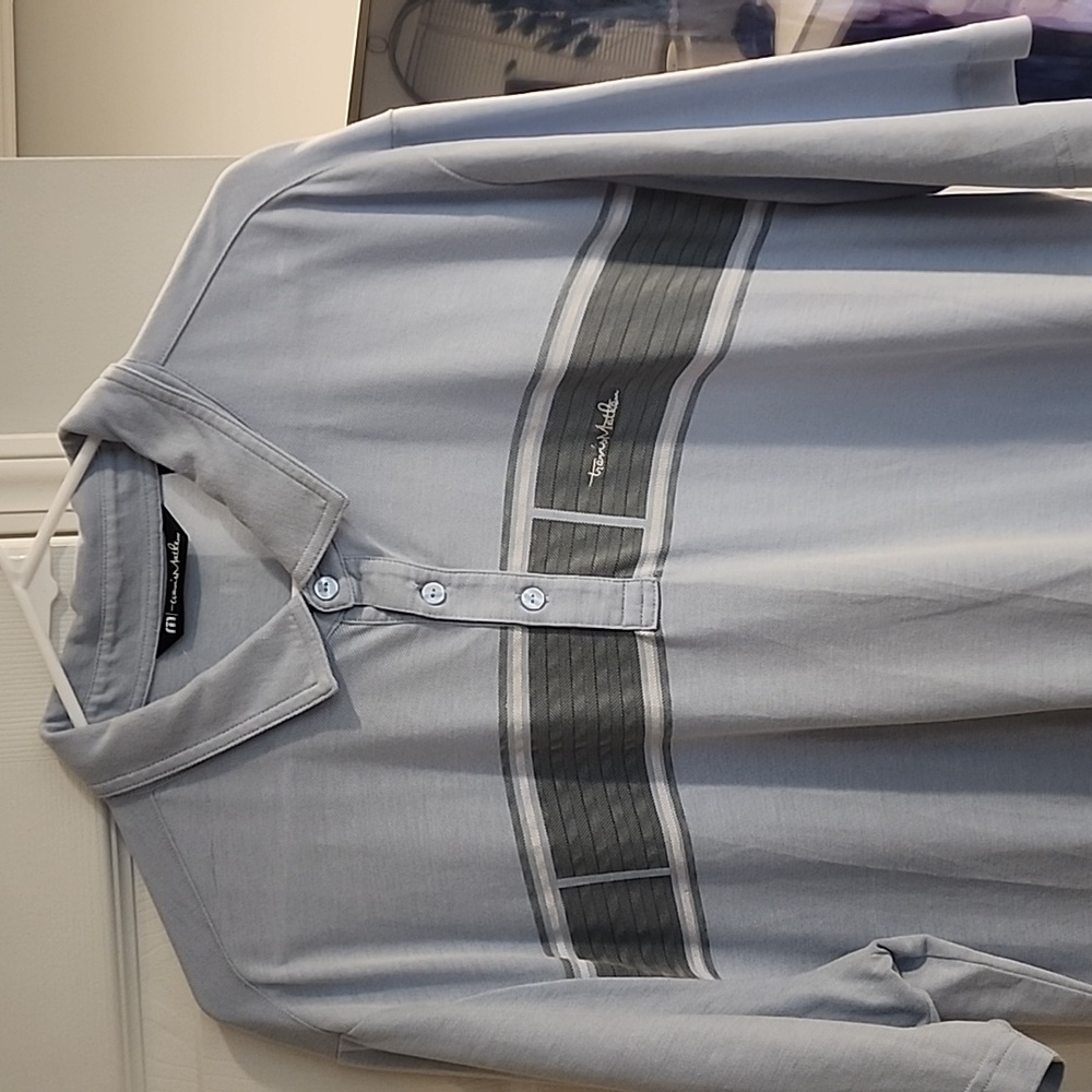 Travis Mathew baby blue golf shirt